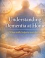 „Understanding Dementia at Home. What really helps in everyday life.“ Unscharfer Hintergrund; Hände halten sich.