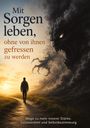 "Mit Sorgen leben, ohne von ihnen gefressen zu werden." Ein Mann geht einem Sonnenuntergang und einer Wolkenkreatur entgegen.