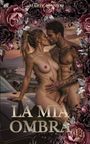 Es stehen "MARILENA" oben und "LA MIA OMBRA" unten. Ein Paar steht nackt, umgeben von Blumen, im Vordergrund.