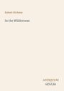 Der Text zeigt "Robert Hichens" und "In the Wilderness". Unten rechts steht "ANTIQUM NOVUM". Beige Hintergrund.