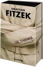 "Sebastian Fitzek: Die Therapie, Psychothriller" und "Droemer". Ein Buch, umhüllt von einer Zwangsjacke.