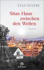 "Sitas Haus zwischen den Welten" von Ulli Olvedi. Stadtansicht mit Häusern und Bergen, unten ein arkana-Logo.