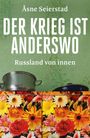 Text: "Åsne Seierstad DER KRIEG IST ANDERSWO Russland von innen HANser". Eine bunte Blumenverzierung unter einem Topf.