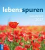 „lebensspuren Kalender 2027“. Rote Mohnblumen auf einem Feld unter klarem blauem Himmel.