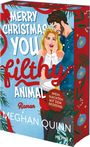 „MERRY CHRISTMAS YOU FILTHY ANIMAL“ steht über einem fröhlichen Paar auf einem weihnachtlich gestalteten Buchcover.