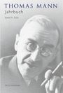 "THOMAS MANN Jahrbuch Band 39 2026" in blauen und schwarzen Buchstaben, unscharfes Porträt eines Mannes mit Brille und Pfeife.