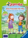 Titel: "Eine Freundin für Mia". Zwei Kinder stehen im Grünen, halten sich an den Händen, ein Mädchen hält eine Katze.