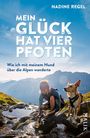 Titel: "Mein Glück hat vier Pfoten". Untertitel: "Wie ich mit meinem Hund über die Alpen wanderte". Frau mit Hund an Bach.