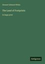 Text: "Stewart Edward White, The Land of Footprints, in large print, Antigonos." Einfache, grünfarbige Buchcovergestaltung.