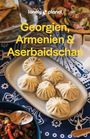 Text: "Georgien, Armenien & Aserbaidschan." Darunter gefüllte Teigtaschen auf einem blauen Mustertuch.
