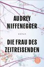 Text: "Audrey Niffenegger - Roman - Die Frau des Zeitreisenden". Zweige mit orangen Blumen im Hintergrund.