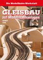 Text: "Die Modellbahn-Werkstatt. GLEISBAU auf Modellbahnanlagen. KERBER STIRL." Hintergrund: Modellbahngleise auf Holz.