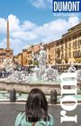 Text: "DUMONT Reise-Taschenbuch", "rom". Eine Frau betrachtet einen belebten Platz mit einem Brunnen und einem Obelisken.