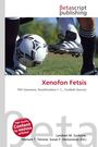 Logo "Betascript Publishing". Titel "Xenofon Fetsis", Fußballthema, Fußballschuhe und Ball auf Gras.
