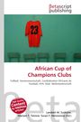 "African Cup of Champions Clubs" steht in rotem Text auf weißem Hintergrund. Oben hängt ein rotes Trikot mit der Nummer 23.
