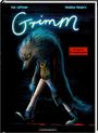 Oben steht "Kai Lüftner, Wiebke Rauers". Titel "Grimm". Unten "Ein Buch für Erwachsene". Gezeichnet: Wolf im Anzug.
