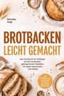 „Brotbacken leicht gemacht“. Ein Laib Brot, Mehl und Körner auf einem Tisch arrangiert.