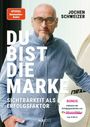 Text: "Du bist die Marke", "Sichtbarkeit als Erfolgsfaktor", "Jochen Schweizer". Mann mit Brille in blauem Hemd.