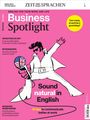 Magazin-Cover mit pinkem Hintergrund: "Business Spotlight", "Sound natural in English", tanzende Figur mit Mikrofon.