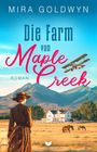Texte: "Mira Goldwyn", "Die Farm von Maple Creek", "Roman", "Empire Verlag". Frau in vintage Kleidung schaut auf Bauernhof.