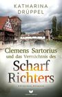Titel: "Clemens Sartorius und das Vermächtnis des Scharfrichters". Hintergrund: Historische Gebäude an einem Fluss.