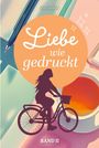 „Liebe wie gedruckt“, „Viola Maybach“, „BAND II“. Eine Silhouette einer Frau auf einem Fahrrad vor Notizbüchern und Tee.