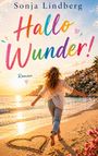 Text: "Sonja Lindberg", "Hallo Wunder!", "Roman". Eine Frau läuft am Strand, Sonnenuntergang, Herz im Sand, bunte Häuser.