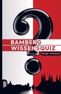 "Bamberg Wissensquiz", "100 Fragen - 400 Antworten". Großes Fragezeichen, Stadt-Silhouette in Rot-Schwarz.