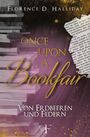 Buchtitel: "ONCE UPON A Bookfair. VON ERDBEEREN UND FEDERN". Stapel Bücher und Papierseite auf lila-goldenem Hintergrund.