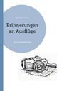 „Erinnerungen an Ausflüge: das Ausfüllbuch“ steht in einem blauen Kreis, darunter eine gezeichnete Kamera.
