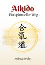 Aikido: Ein spiritueller Weg. Andreas Bruhn. Japanische Schriftzeichen in einem gelben Pinselkreis.