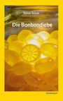 „Rainer Schulz: Die Bonbondiebe. Kinderbuch.“ Gelbe Bonbons in einem Glasgefäß, umgeben von gelbem Rahmen.