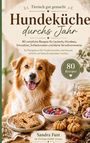 "Tierisch gut gemacht - Hundeküche durchs Jahr." Ein fröhlicher Hund neben Plätzchen und Beeren in Schalen.