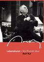 Lebenskunst – Ein Porträt über Rolf Ruf. Eine schwarz-weiße Fotografie eines nachdenklichen Mannes im Raum.