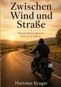 "Zwischen Wind und Straße. Warum Motorradfahren mehr ist als Fahren." Ein Biker fährt bei Sonnenuntergang auf einer Landstraße.