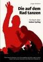 "Die auf dem Rad tanzen" von Jürgen Reitböck. Silhouetten tanzen vor hellem Hintergrund.