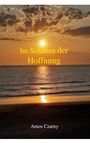 Text: "Im Schatten der Hoffnung", unten "Amos Czarny". Sonnenuntergang über dem Meer mit reflektierendem Licht.