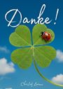 "Danke!" in verspielter Schrift, darunter "Christof Lorenz". Kleeblatt mit Marienkäfer vor blauem Himmel.