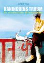 Text: "Kathrin Feile", "Kaninchen Traum", "Ein neurologischer Abenteuerroman." Illustration: Kaninchen auf einer Mauer.
