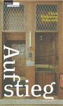 Text: „Aufstieg“, „Clara Katharina Pollaczek“, „leykam: Universitätsverlag“. Hintergrund: Holzkabinen mit Gitterfenstern.