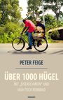 "Peter Feige. Über 1000 Hügel mit 'Eisenschwein' und High-Tech Rennrad." Zwei Menschen auf einem Fahrrad vor grüner Landschaft.