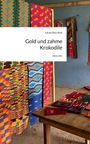 "Gold und zahme Krokodile" von Juliane Ratz-Breil. Bunte Webstoffe hängen und liegen auf Tisch, blau-grauer Hintergrund.