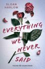 "EVERYTHING WE NEVER SAID" in kräftigen Buchstaben, rote Rosenblätter und grüne Blätter an einem gebrochenen Stiel.