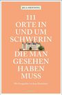 Cover eines Buches in rosa mit Titel "111 Orte in und um Schwerin, die man gesehen haben muss". Bild eines Schlosses.