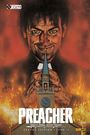 Ein Mann mit diabolischem Lächeln hält einen Kirchturm. "PREACHER", "Garth Ennis, Steve Dillon", "DELUXE EDITION 1 (VON 3)". Flammen im Hintergrund.