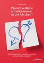 "Warum verliebe ich mich immer in die Falschen?" Zerrissenes Papierherz auf rotem Hintergrund.