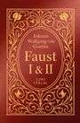 Covertext: "Johann Wolfgang von Goethe. Faust I & II. LIWI VERLAG." Rotes Buch mit goldenen Verzierungen und Blumen.