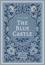 Der Text lautet: "L. M. Montgomery, The Blue Castle, LIWI Verlag." Die Illustration zeigt ein florales Muster in Blau.