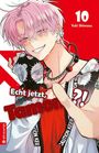 "10 Yuki Shiwasu" und "Echt jetzt, Tamon?!" Ein Charakter mit rosa Haaren und trendiger Kleidung blickt lächelnd.