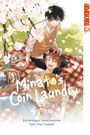 "Minato's Coin Laundry" steht auf einer Picknickdecke unter blühenden Kirschblüten. Zwei junge Männer entspannen darauf. Links oben "TOKYOPOP".